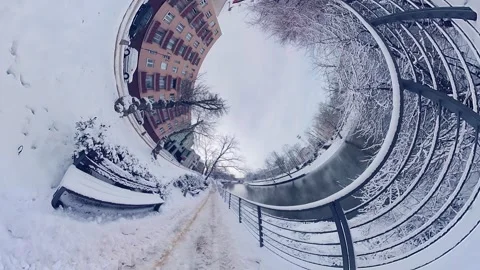 A 360-degree view of a snowy path in a city park Stock Footage 268133775