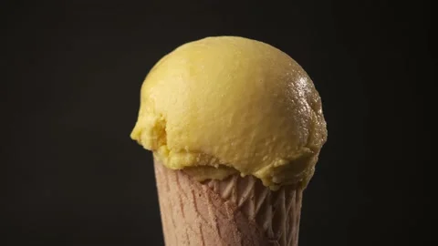 360 degrees rotation of a delicious mango ice cream cone. Sweet and dessert c Stock-Footage 161112632