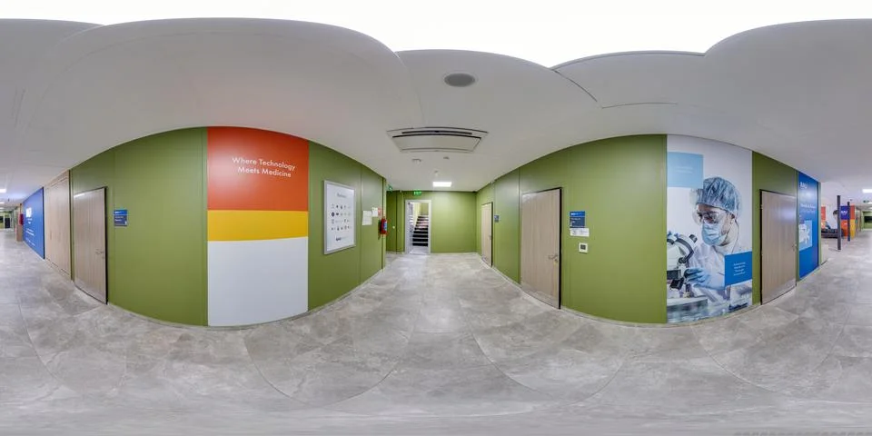 360 degrees view in interior of empty corridor in medical university Fotos de archivo