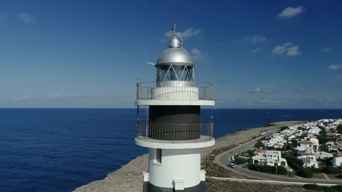 360 drone flight around a lighthouse on the island of Menorca Stock Footage 119536246