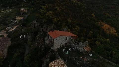 360 drone flight around a small mountain town Stock Footage 122298979