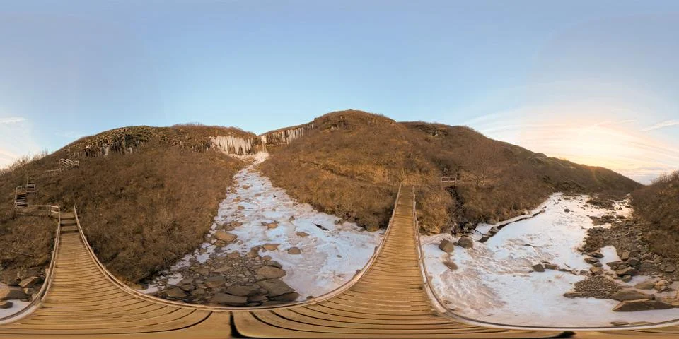 360 equirectangular photo bridge path at Magnusarfoss rock and ice formatio.. Foto stock