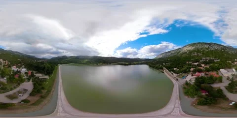 360 flight above lake 動画素材 141737632