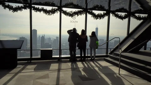 360 Observation Deck in Chicago / 94th floor / People looking at downtown Stock Footage 100447558