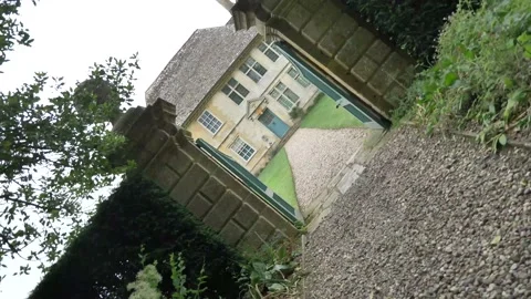 360 video gate with garden and old house knock on old door Video stock 134356889