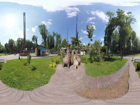 360 video panoramic view of Giraffe's statues family in the Ukrainian park Stock Footage 76431451