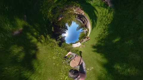 The 360 view of the man cutting off twigs Stock Footage 91473120