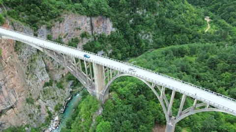 360 View of Tara Bridge in Montenegro with Cars Passing – 4K Drone Footage Stock Footage 313903053