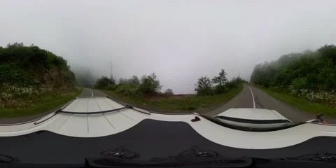 360 VR Cadillac Escaley rides the highway in the fog Stock Footage 167286111