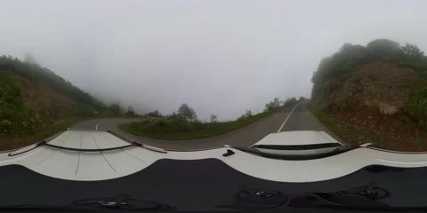 360 VR The car moves along the highway in the fog Stock Footage 167286558