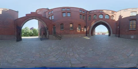 360 VR - Dome Shaped Gate, Red Brick Building, Cobblestone Street Stock Footage 135235127