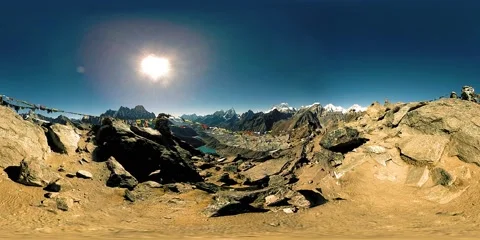 360 VR Gokyo Ri mountain top. Tibetan prayer Buddhist flag. Wild Himalayas high Stock Footage 165582006