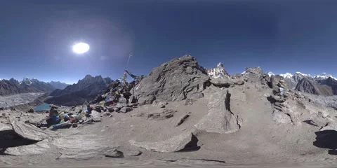360 VR Gokyo Ri mountain top. Tibetan prayer Buddhist flag. Wild Himalayas high Stock Footage 165582990