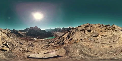 360 VR Gokyo Ri mountain top. Tibetan prayer Buddhist flag. Wild Himalayas high Stock Footage
