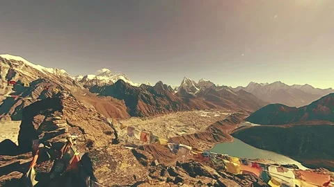 360 VR Gokyo Ri mountain top. Tibetan prayer Buddhist flag. Wild Himalayas high Stock Footage 234163545