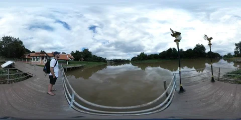 360 Vr Guy Looking Out Over The Ping River In Chiang Mai, Thailand Stock Footage 95113437