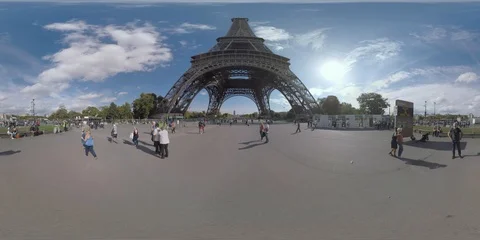 360 VR People visiting the Eiffel Tower in Paris, France Stock Footage