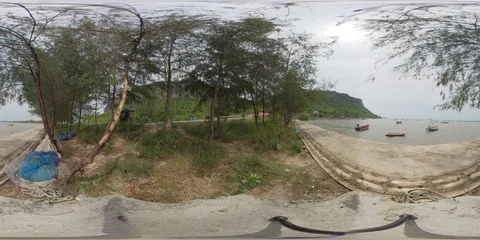 360 VR Shore with green trees, colorful wooden boats and green mountains Stock Footage 119445715