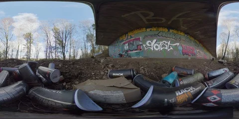 360 VR Spray Cans On Ground, Street Art Graffiti Wall Stock Footage 129490942