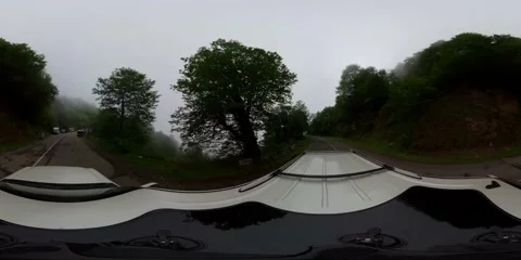 360 VR An SUV moves along a country road in cloudy weather Stock Footage 167285658