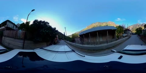 360 VR SUV moves the road along the suburban houses Video stock 167550293