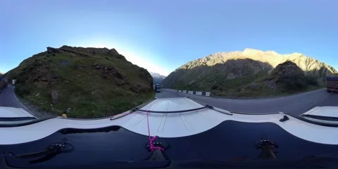 360 VR SUV rides on the road against the background of mountains Stock Footage 167340825