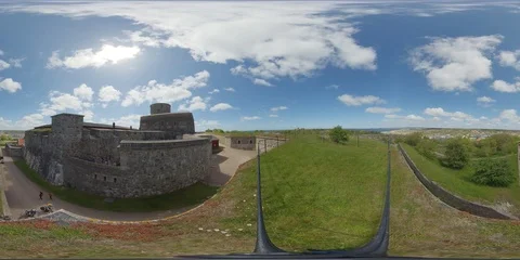 360 VR top view of scandinavian fortress with people walking Stock Footage 111340019