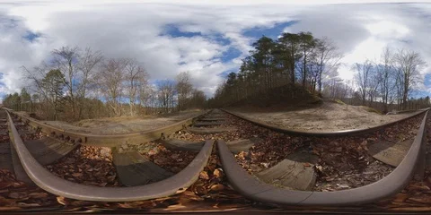 360 VR Video of Old Rusty Steel Rails Railway in Autumn Forest on Sunny Day Stock Footage 126838383