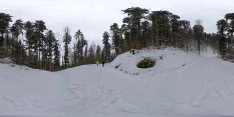 360 VR Video, Virtual Reality of two men walking on snowy path in Switzerland Stock Footage 148498641