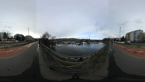 360 VR view at Vltava River and Fishermen sitting on its Quay in Prague Stock Footage 121358078
