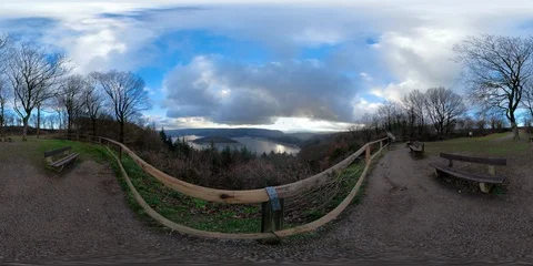 360 VR Viewpoint in forest with vista over lake at sunset Stock Footage 101223090