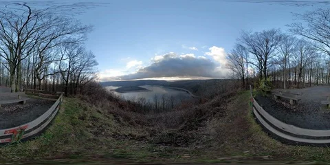 360 VR Viewpoint in forest with vista over lake at sunset Stock Footage 101235076