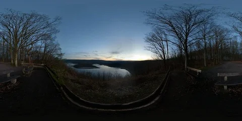 360 VR Viewpoint in forest with vista over lake at sunset Stock Footage 101247619