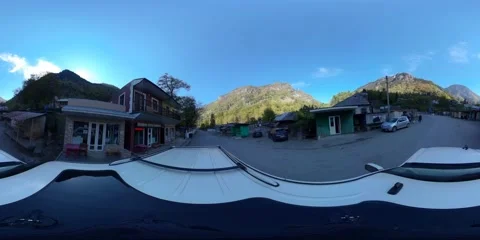 360VR auto rides along the roadside market Stock Footage 168114604