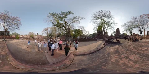 360VR Buddha head embedded in a Banyan tree in Ayutthaya Stock Footage 94422092