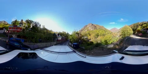 360VR car drives through the mountain village Video stock 167550622