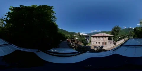 360VR car drives through the mountain village Stock Footage 167619252