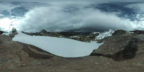 360VR snow-covered summit overlooking valley and lake 5760x2880 45 seconds Stock Footage 109522379