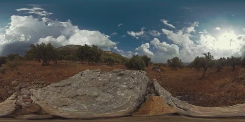 360VR Timelapse of clouds over mountains with olive trees Stock Footage 97329569