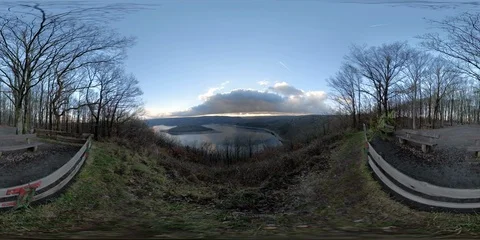 360VR Timelapse of young man watching over lake landscape on viewpoint Stock Footage 101226519