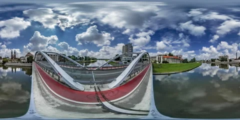 360Vr Video Timelapse Bridge Red Bicycle Lane Cars Are Driven Cityscape of Stock Footage 67704407