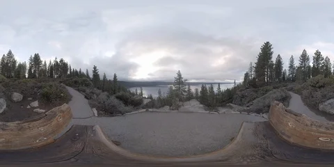 360VR Viewpoint with a wooden bench over cloudy lake Stock Footage 110623485