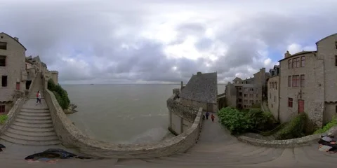 360VR Walking to Tour Boucle in Mont Saint Michel in Normany France Stock Footage