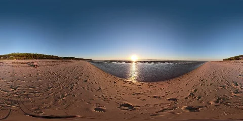 360VR Young man at the beach watching the sunset Stock Footage 97905679