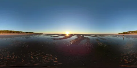 360VR Young man at the beach watching the sunset Stock Footage 97907114