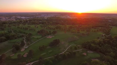 3.61 Manhattan Golf Course Slow Pan to Reveal Low Sunset 001710 Stock Footage 90258539