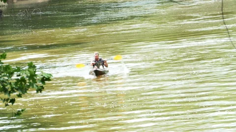 3641 Man Kayaking on River During Windy Spring Day, 4K Stock Footage 50391969
