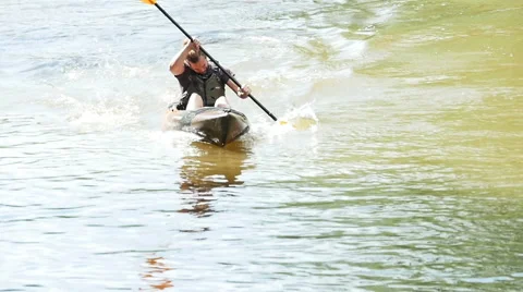 3645 Man Kayaking Fast on River During Spring Day in Slow Motion Stock Footage 50393824