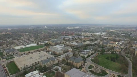 3.69 Central Manhattan Flying High Over Stone Buildings and Smoke Stack 001609 Stock Footage 90258642