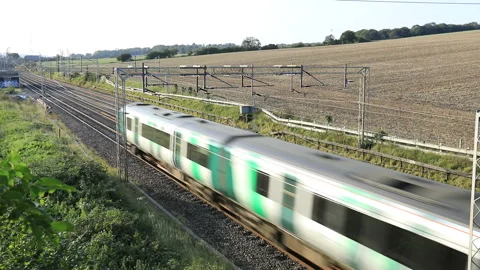 377 class Southern rail train near Berkhamsted town, West Coast Main Line Stock Footage 140802098